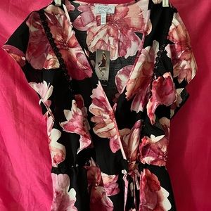 Cute floral peplum top.